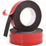 Roll of Red Double Gum Tape by Jeewa Plastic Close-up of Red Double Gum Tape’s adhesive edge Red Double Gum Tape applied to a work surface Side-by-side comparison of ½″ and 1″ Red Double Gum Tape widths